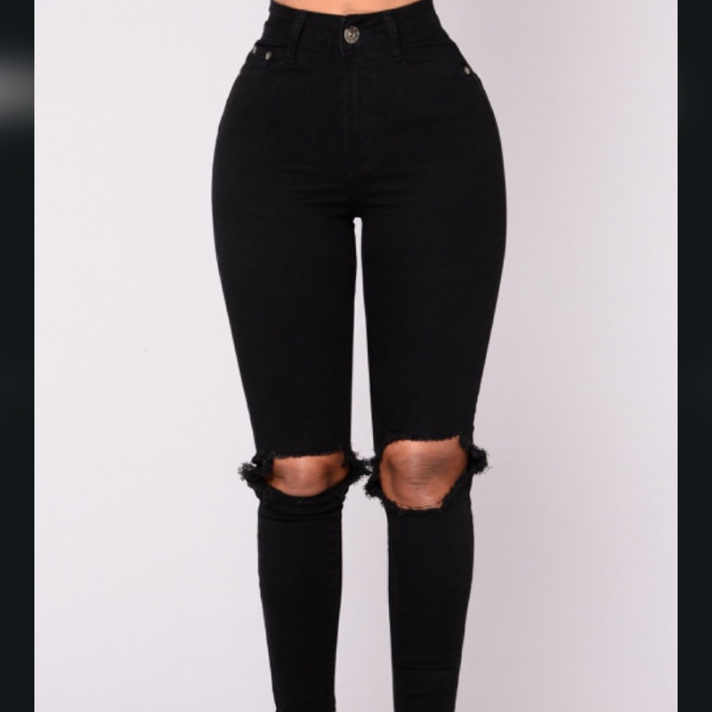 High waisted distressed jeans. NEVER WORN